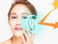 Volto di donna con simbolo di protezione UV e sole. La cura della pelle è fondamentale per ogni fototipo.