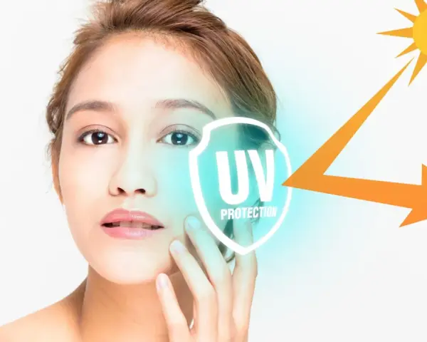 Volto di donna con simbolo di protezione UV e sole. La cura della pelle è fondamentale per ogni fototipo.